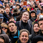 audience of people staring up